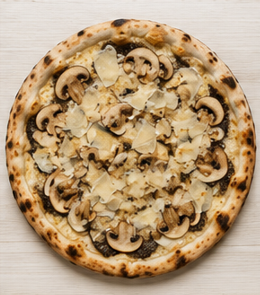 Pizza Tartufo à la crème de truffe et champignons, sur assiette